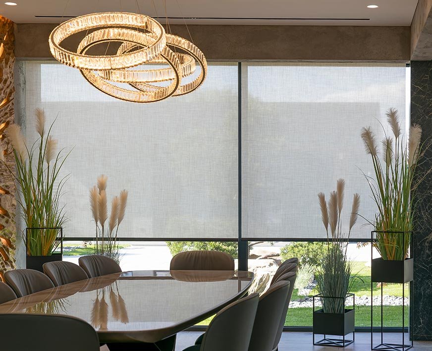 Technician installing motorized blinds in Squamish home